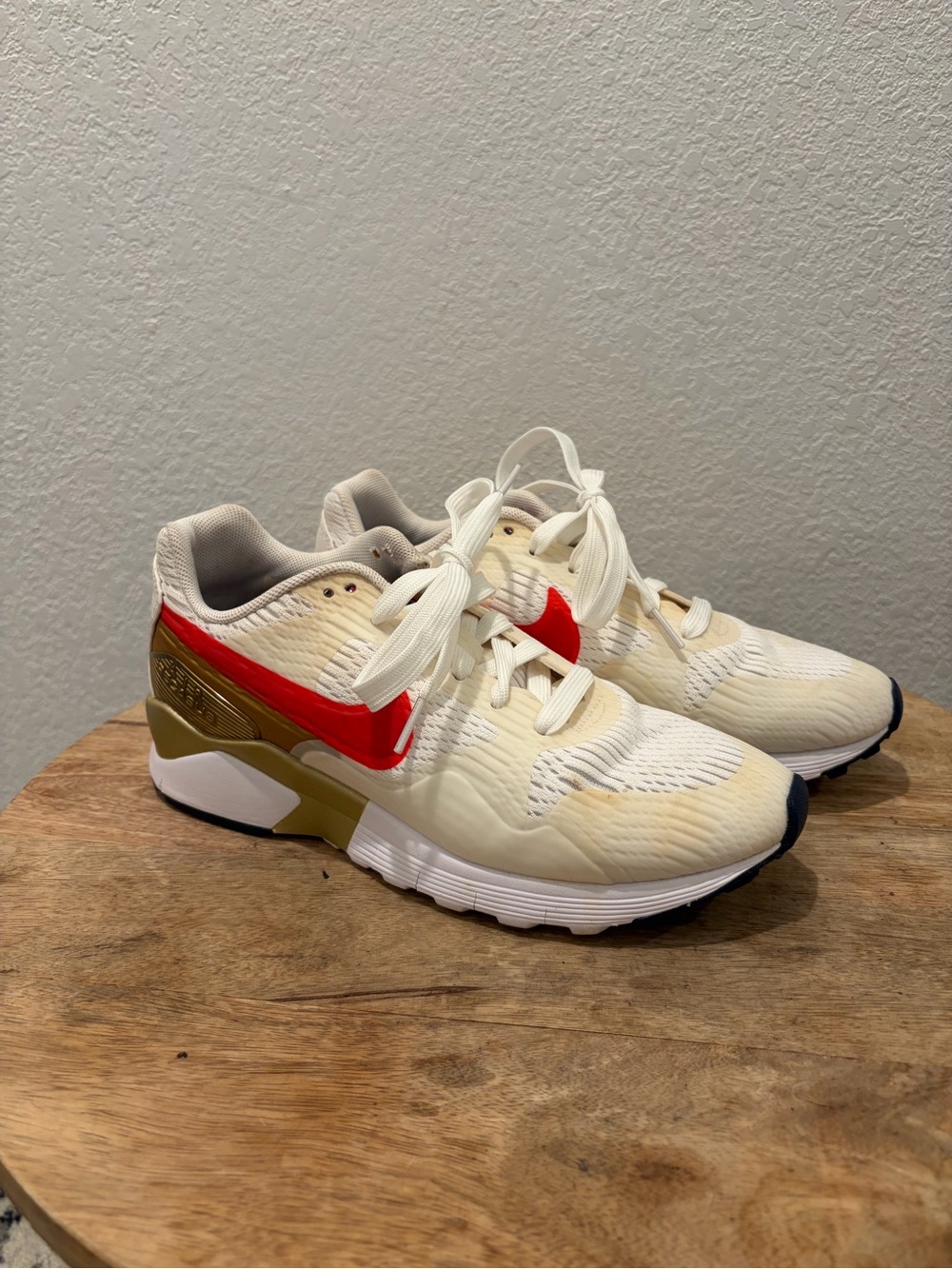Nike Cream and Red Low-Top Sneakers with Gold Accents